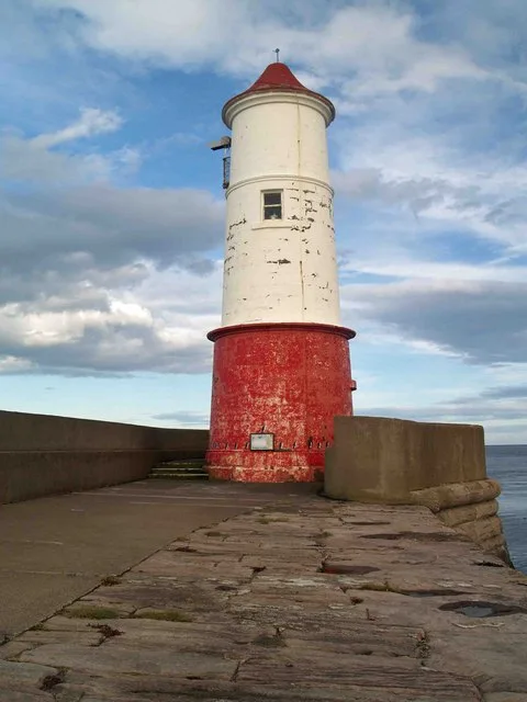 Pier And Lighthouse