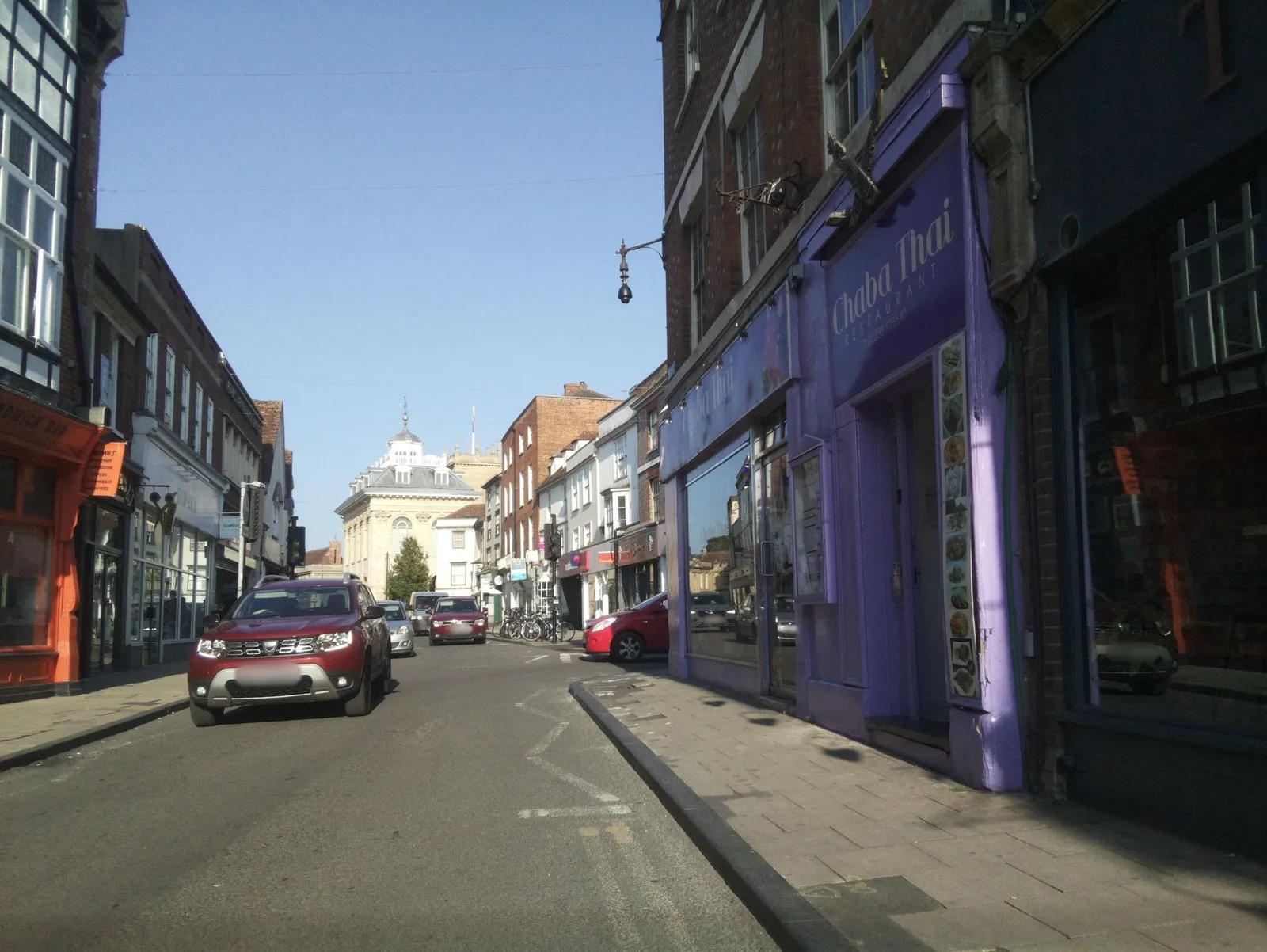 Qué Pasa — street-level view
